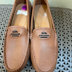 Coach leather driving move